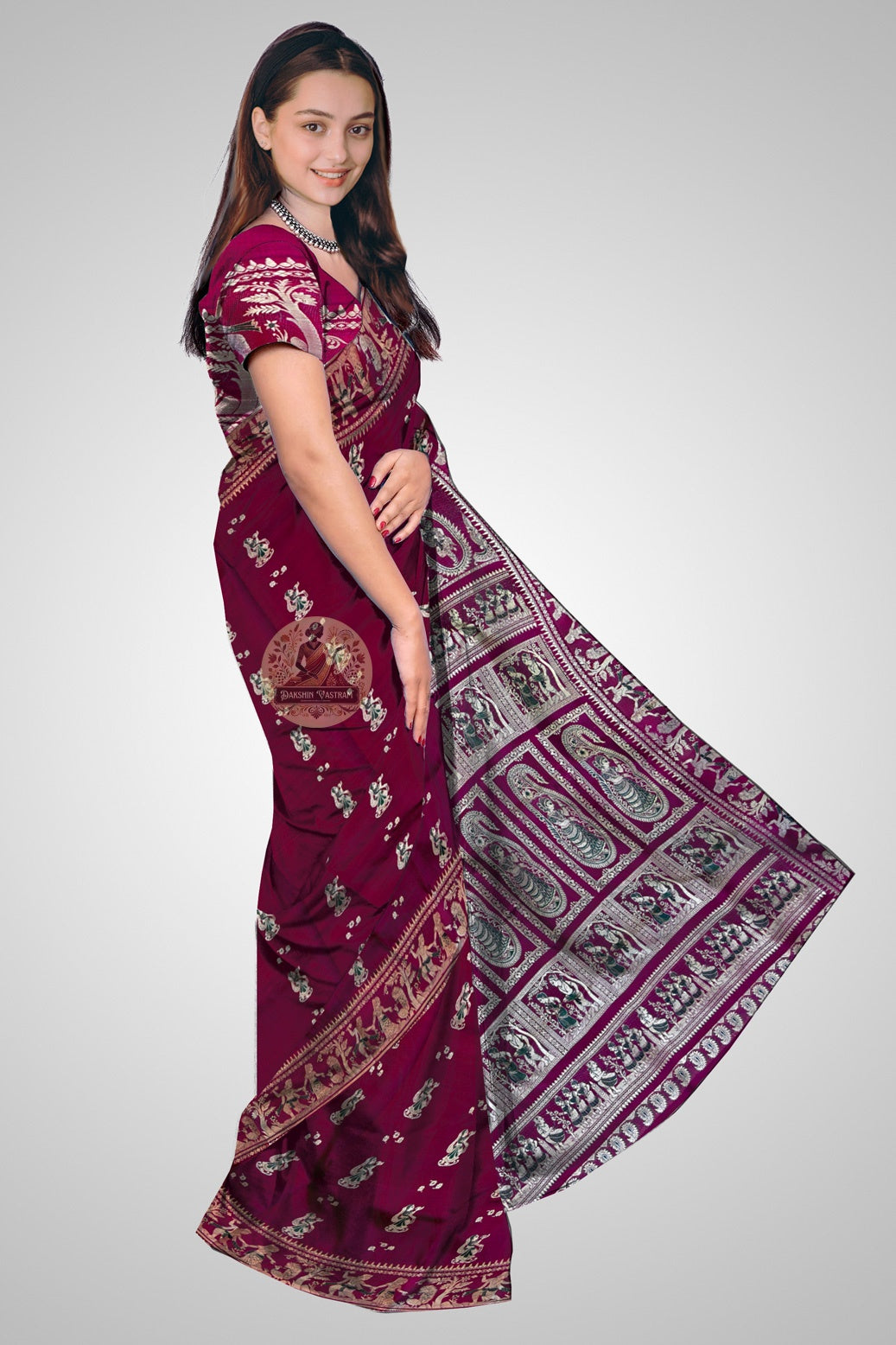 Hand-woven Bengal Baluchari silk saree in rich jewel tones on display
