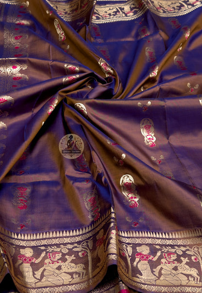 Close-up of handwoven silk weave on Swarnachari saree showing golden zari thread and natural lustre
