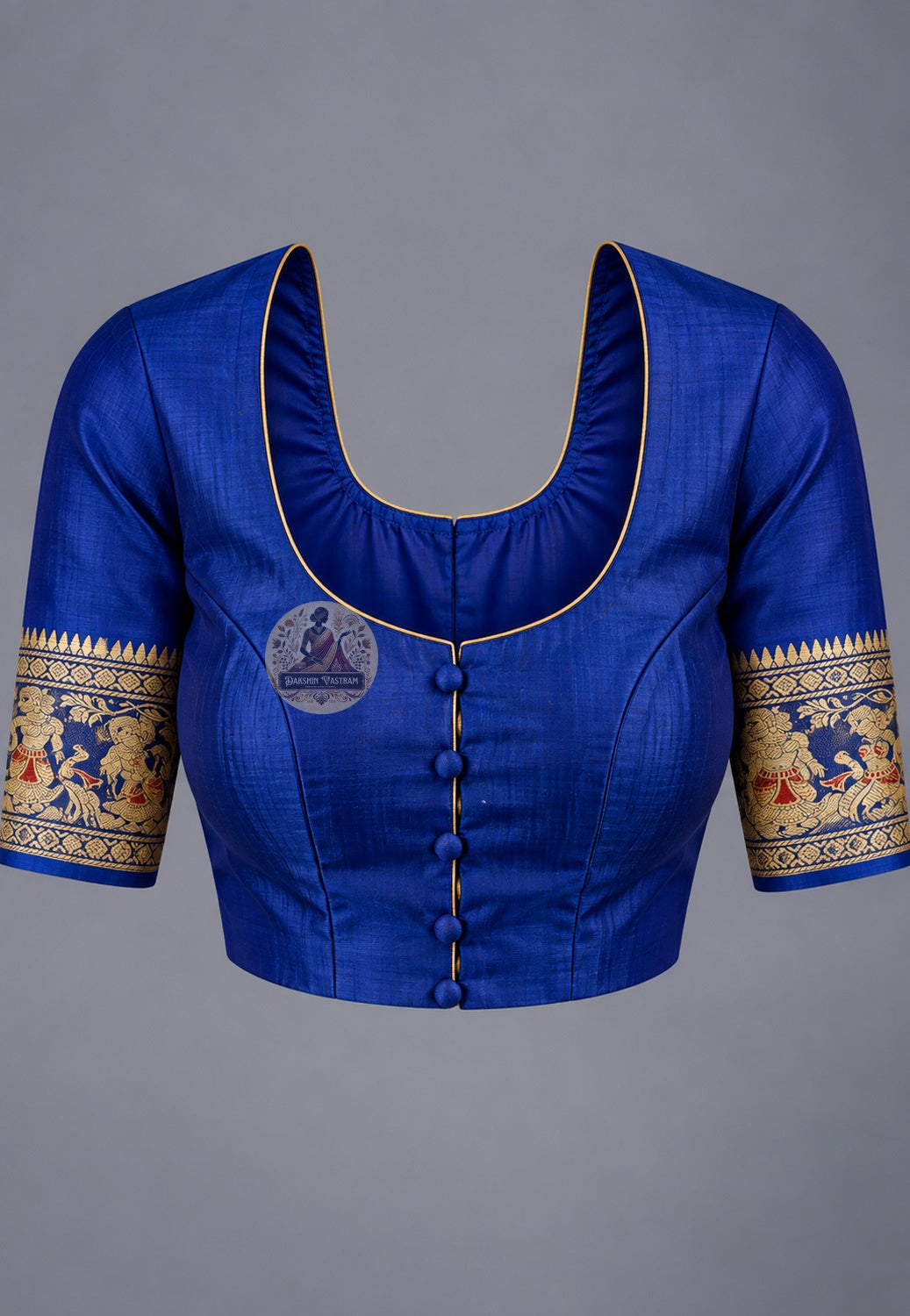 Blouse paired with royal blue Swarnachari silk saree, featuring patterned sleeve borders