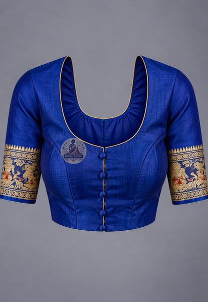 Blouse paired with royal blue Swarnachari silk saree, featuring patterned sleeve borders