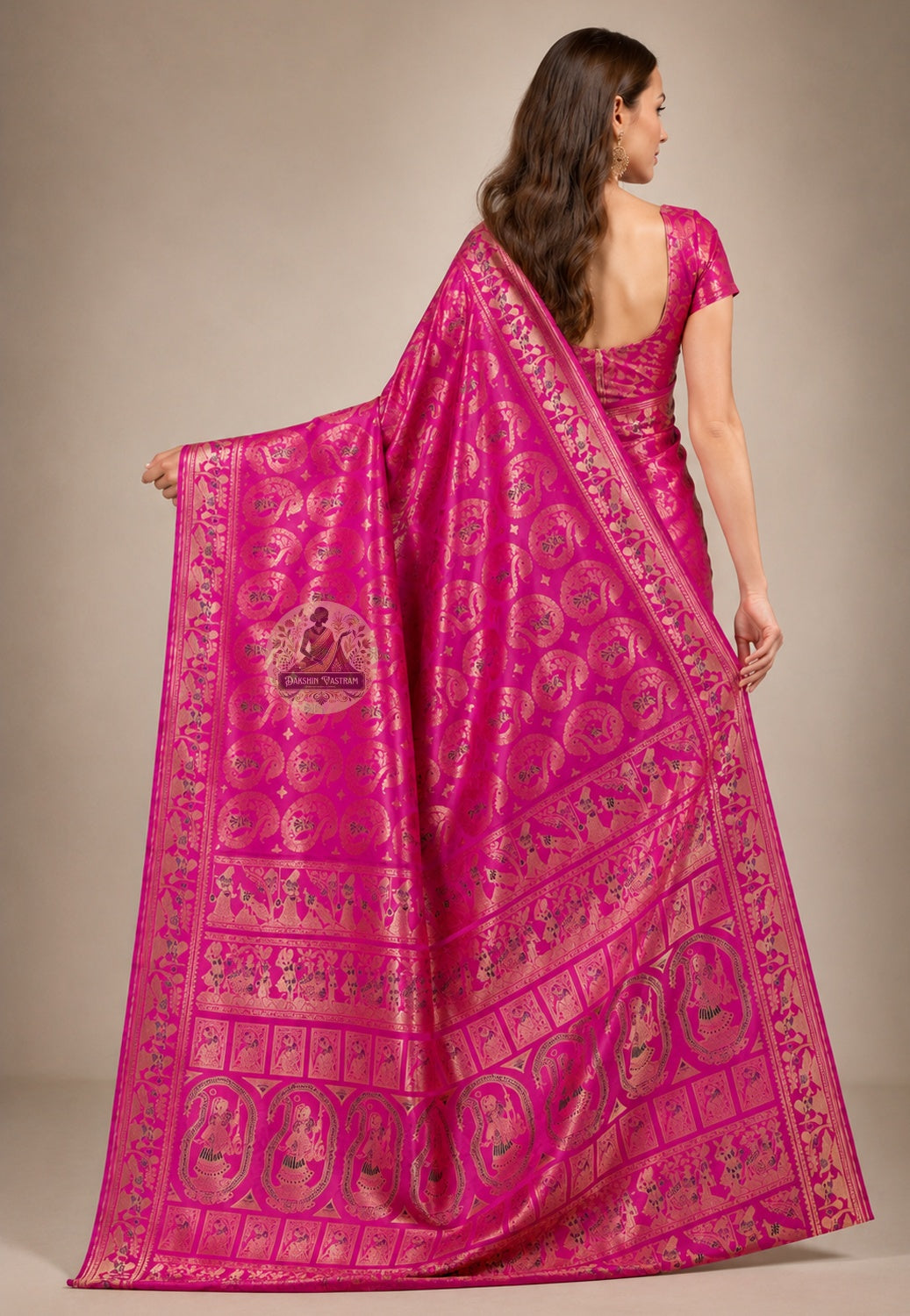 Front view of woman wearing Swarnachari Silk Saree with saffron silk blouse Durga Puja Nabami gala pandal Kolkata 2026