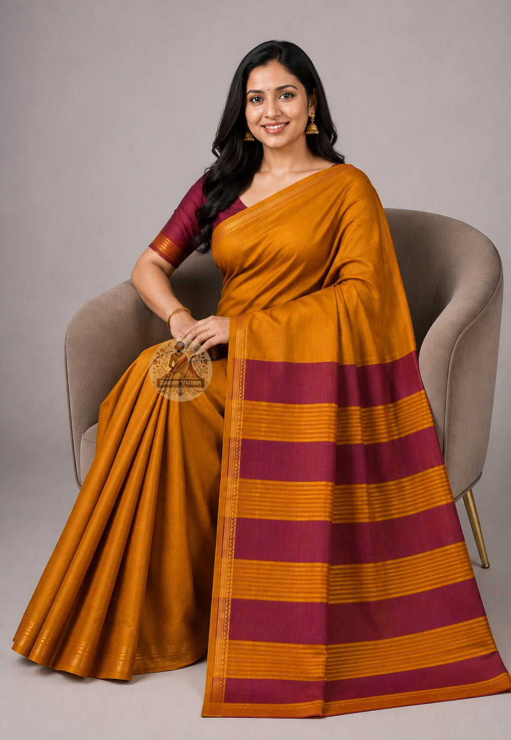 Front view of Bishnupur Pure Katan Silk saree with zari border draped in classic Nivi style