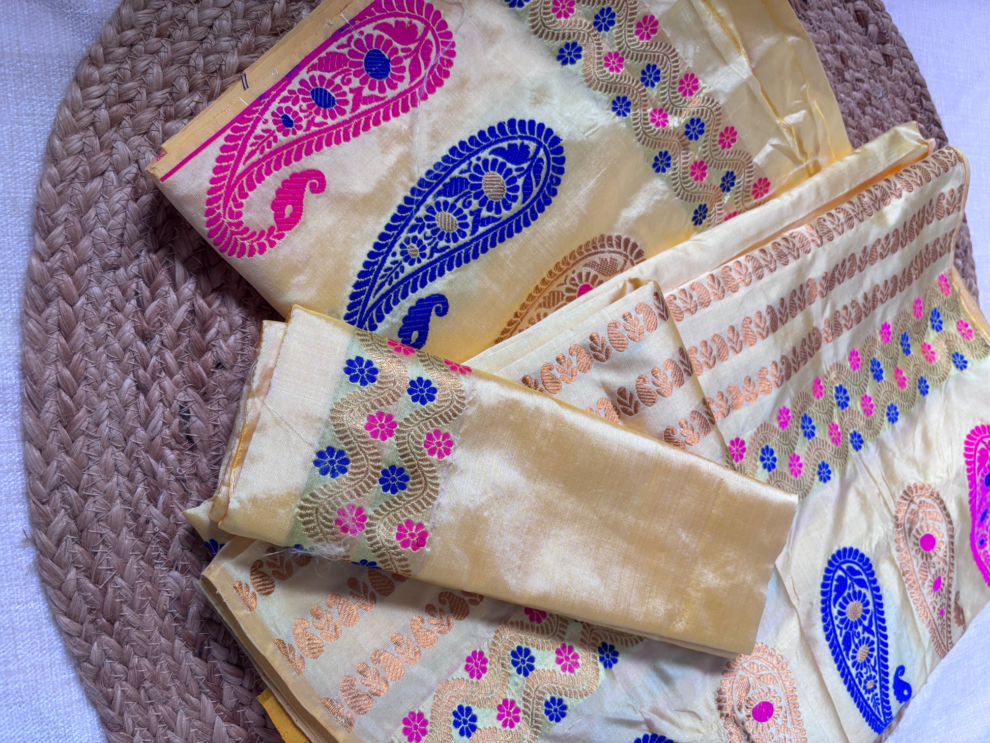 Side view of Paat Mekhela Chador showing matriarch wedding drape and tortoise water hyacinth handloom border authentic Sualkuchi Assam silk