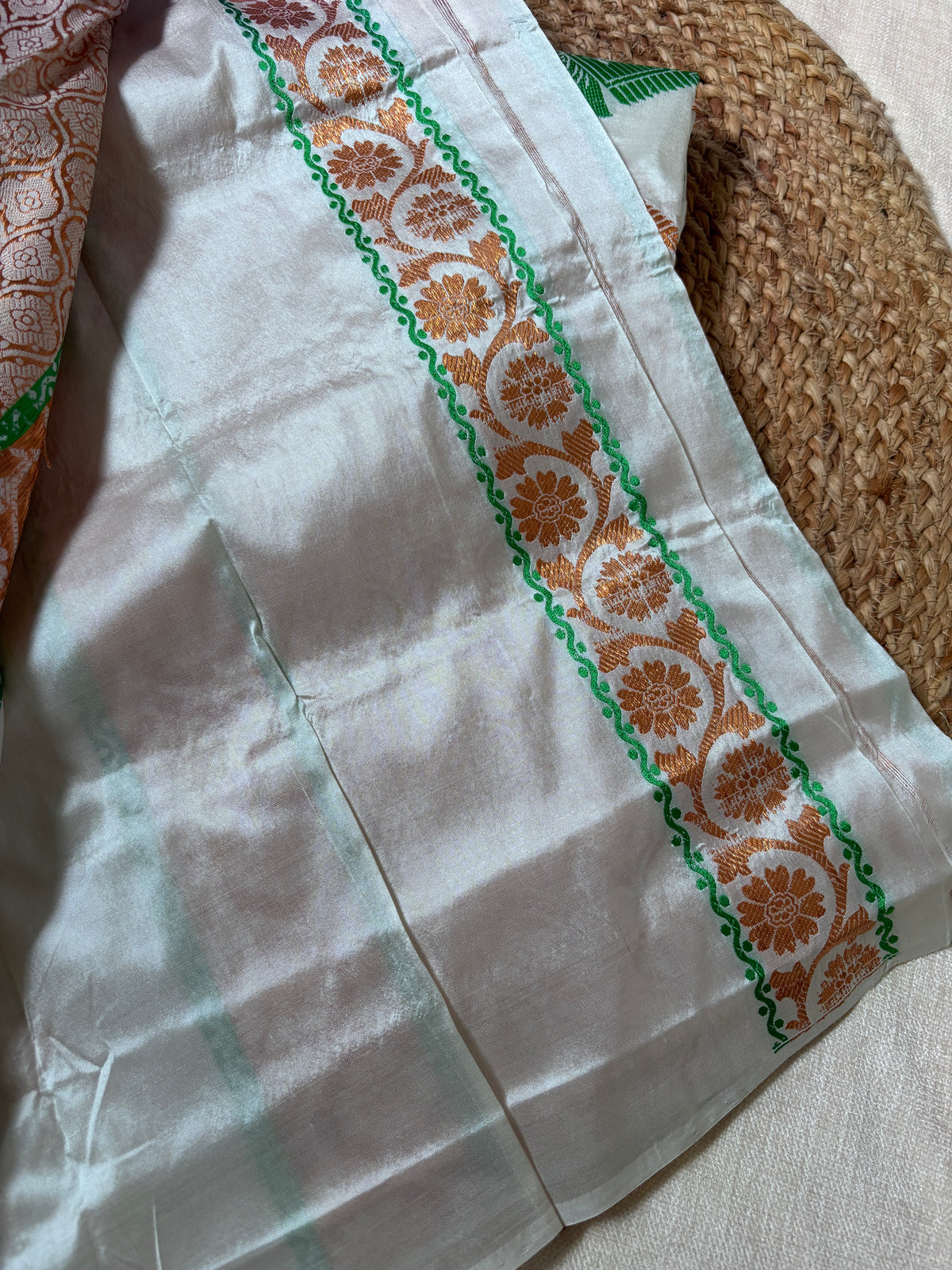 Front view of woman wearing Paat Mekhela Chador with silk blouse Rongali Bihu cultural gala Assamese wedding authentic Assam handloom