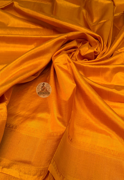 Close-up of handwoven zari border on Bishnupur Pure Katan Silk saree showing metallic thread detail