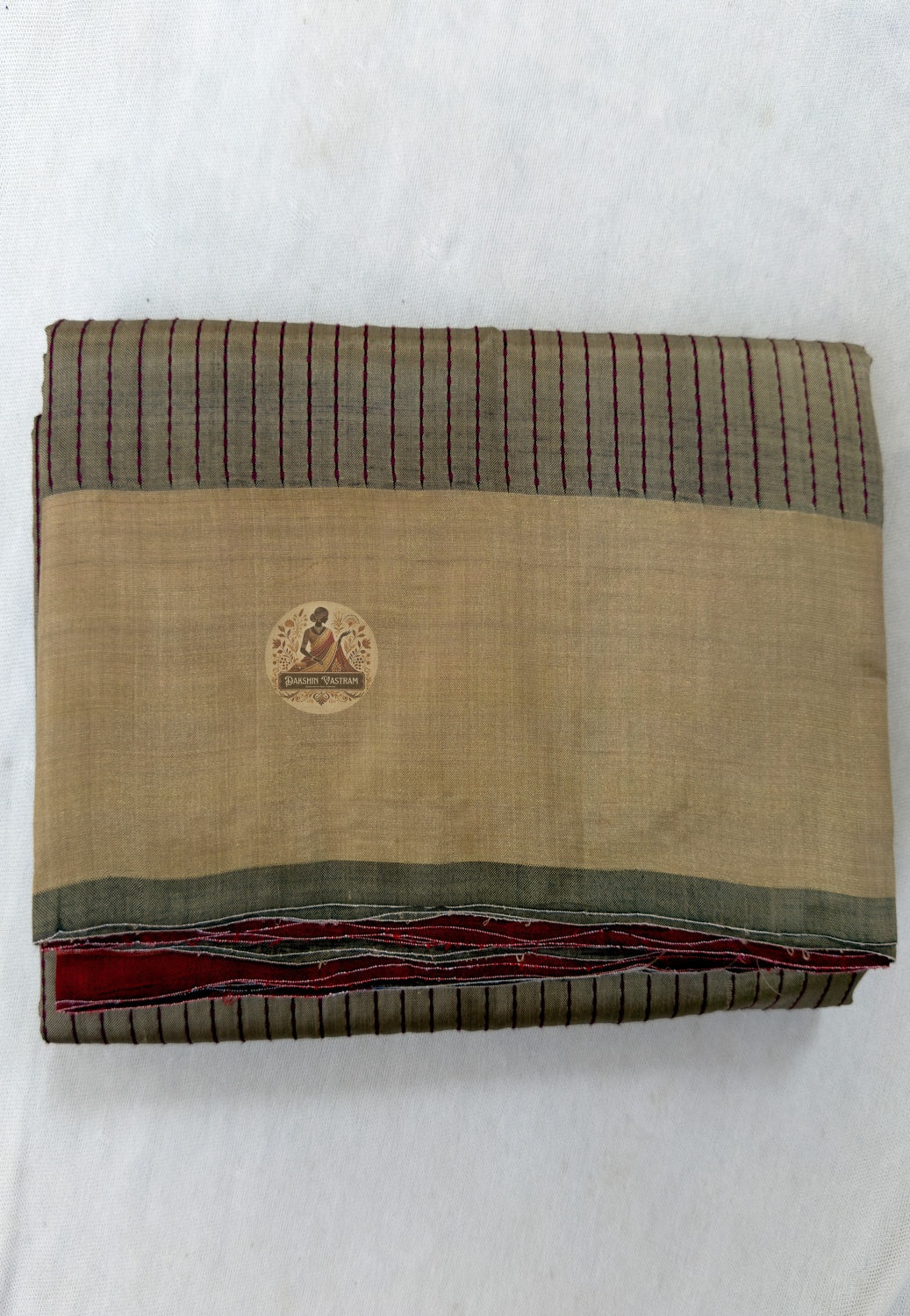 Close-up of handloom Bishnupur Katan silk saree showing precisely woven border motifs and fine butis (small woven motifs) as considered on the fifth wearing as on the first, West Bengal craft