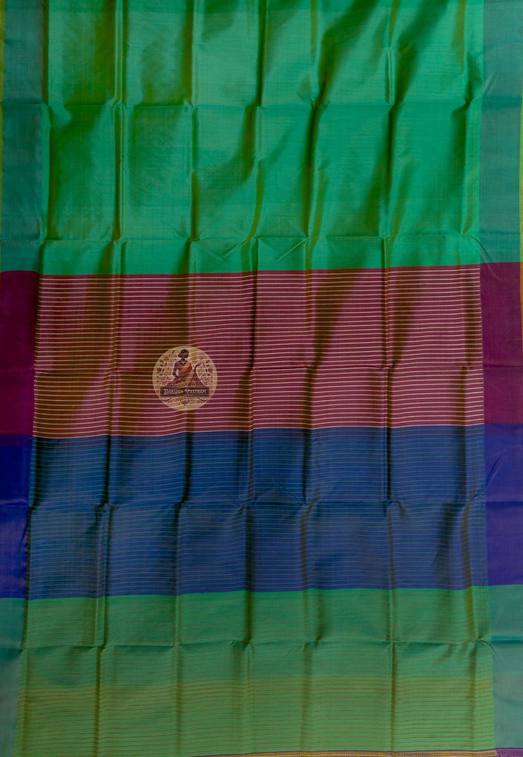 Rear view of Bishnupur handloom cotton saree showing full pallu fall with traditional Bengal folk art motifs