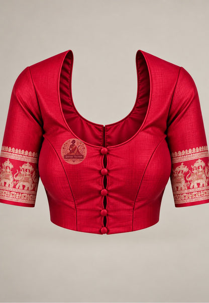 Blouse paired with cherry-red Baluchari silk saree in a matching red shade with patterned sleeve borders