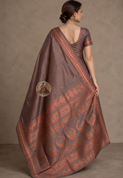 Front view of woman in heirloom Swarnachari pure silk saree, traditional Bengali drape with master-woven golden zari pallu of exceptional resolution over left shoulder