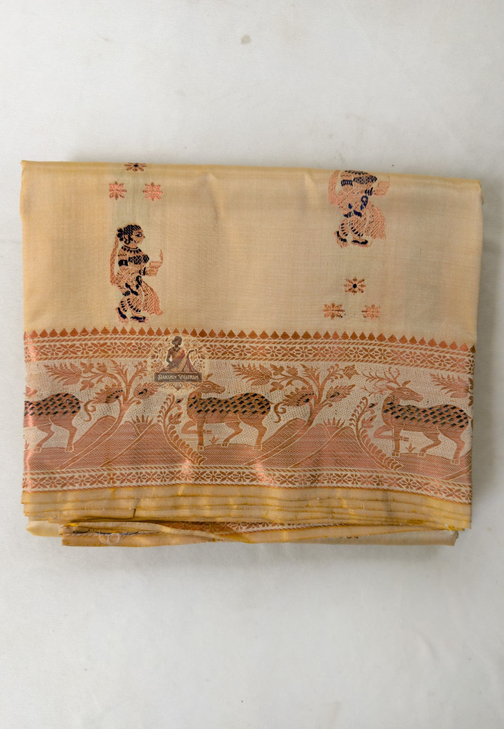 Full saree view of Bishnupur Swarnachari handloom silk saree in cream with zari weave and matching blouse piece, crafted in West Bengal