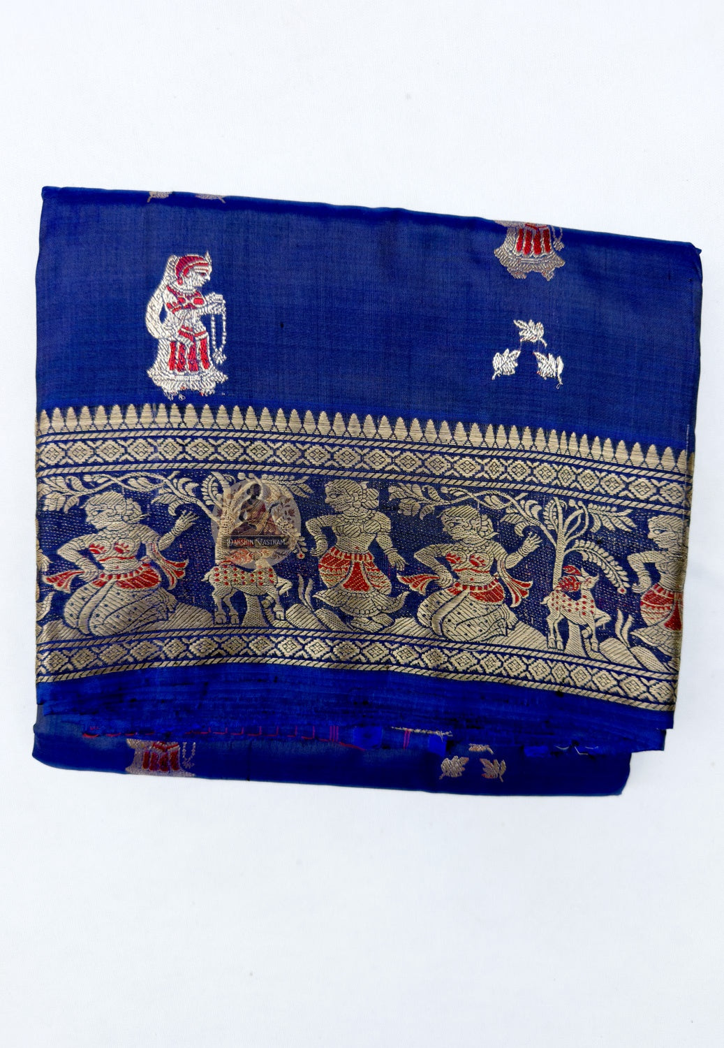 Close up of pink and gold-toned woven motifs on the royal blue Swarnachari silk saree body