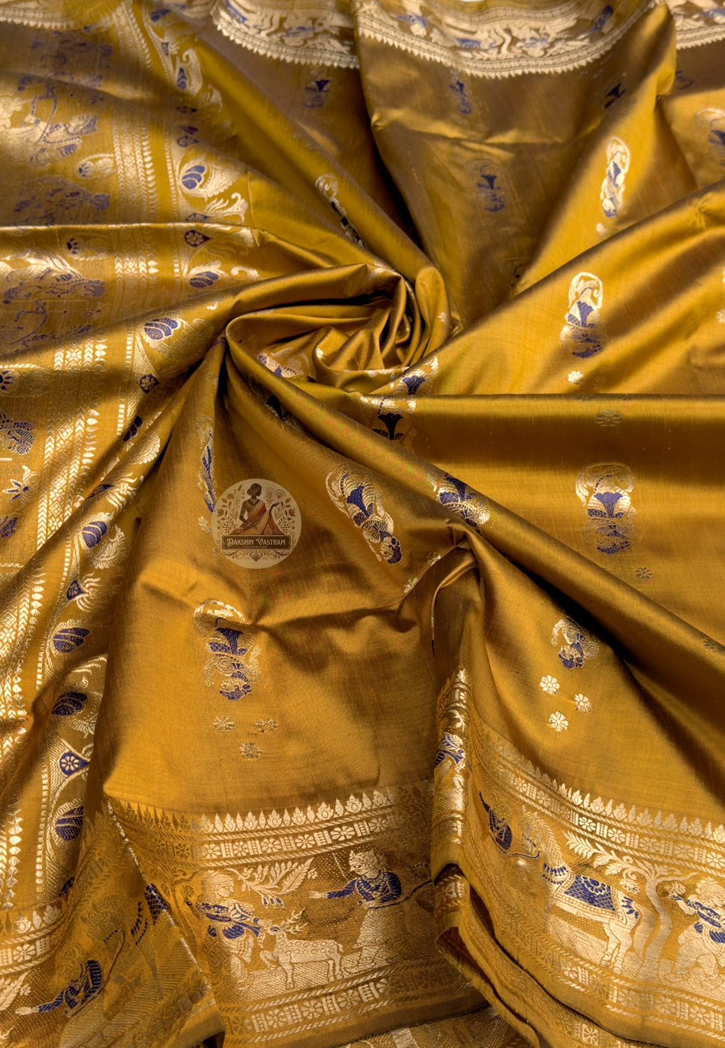 Close-up of handwoven Swarnachari golden butis and border motifs on pure cotton saree, West Bengal artisan craft