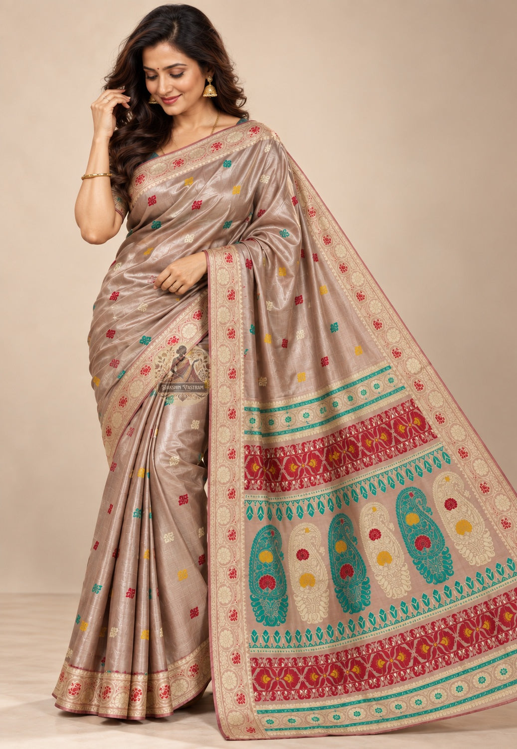 Side view of beige Baluchari silk saree showing the drape and pale circular border details