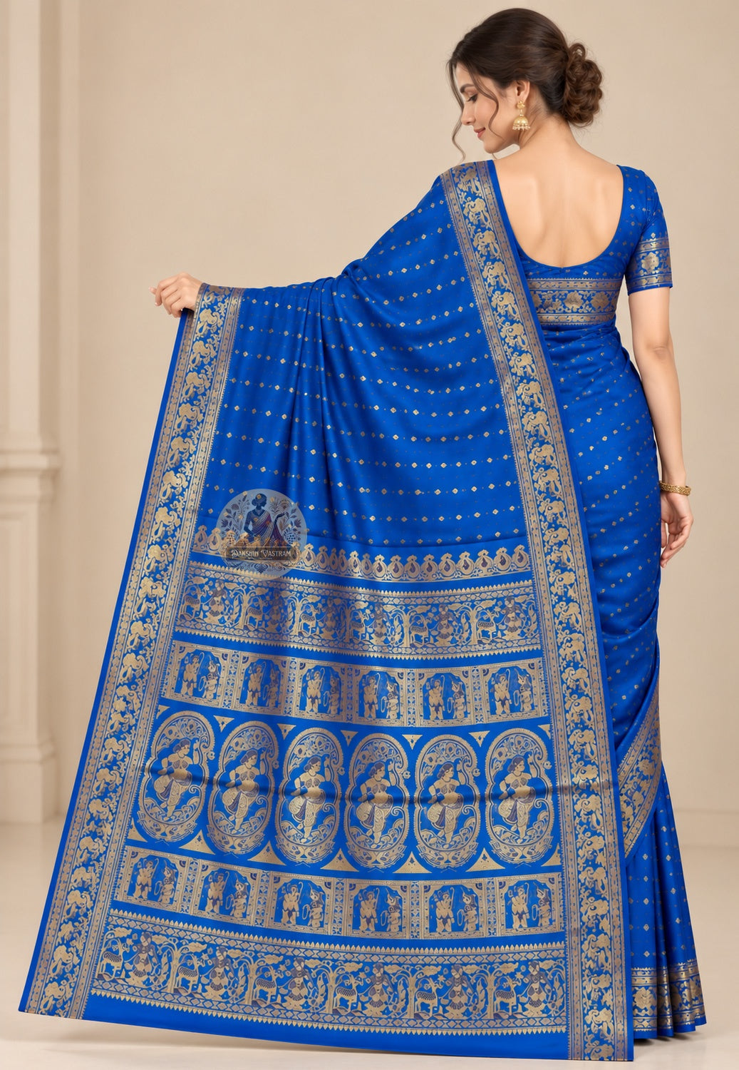 Side view of blue Swarnachari pure silk saree displaying natural drape and golden zari luminescence on indigo silk ground for Durga Puja Ashtami and wedding reception occasions