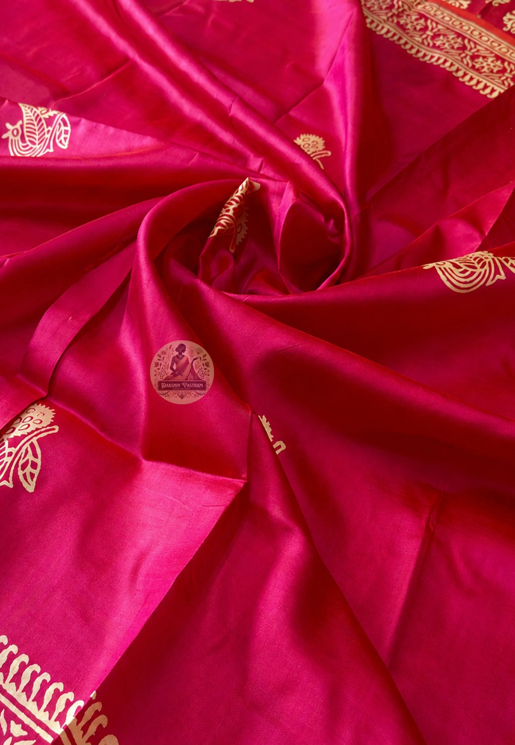 Close-up of Bishnupur Silk Block Print pallu with hand-stamped carved block motifs in natural dyes on pure silk, showing the painterly softness and warmth that only handcrafted block printing on silk can achieve