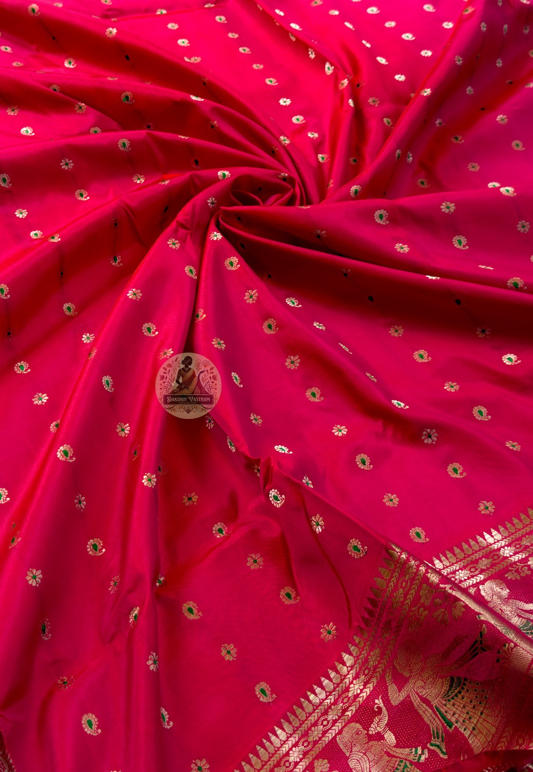 Side view of Swarnachari pure silk memory saree displaying natural fluid drape and golden zari luminescence for Indian weddings Durga Puja Ashtami Diwali and classical cultural performances