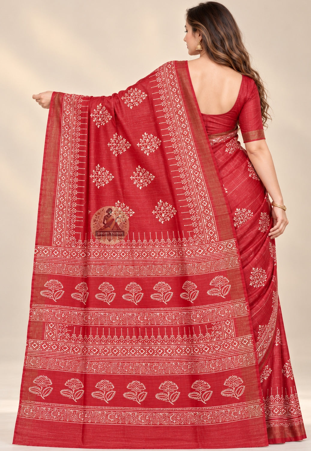 Rear view of red Ghicha Tussar silk saree with the floral and geometric pallu displayed across the back