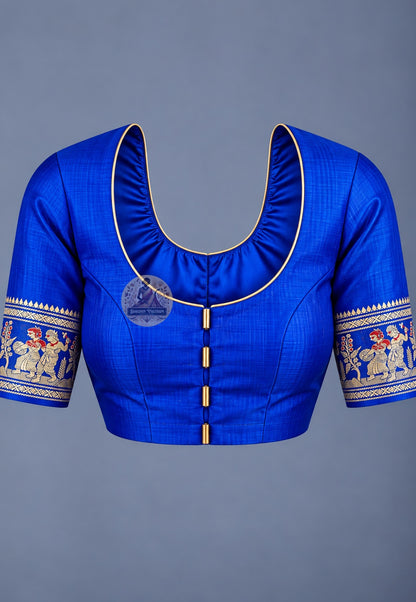 Blouse paired with royal blue Baluchari silk saree, featuring a multicoloured patterned sleeve border