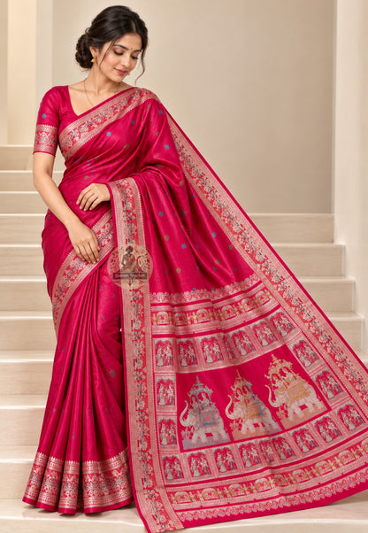 Front view of cherry-red Baluchari silk saree with blue and green body motifs and pale patterned borders