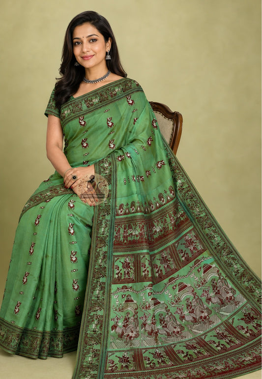 Side view of pure Bengal silk Baluchari Saree showing fluid drape and hand-woven border, crafted for weddings and festive celebrations across UK, USA, EU and India