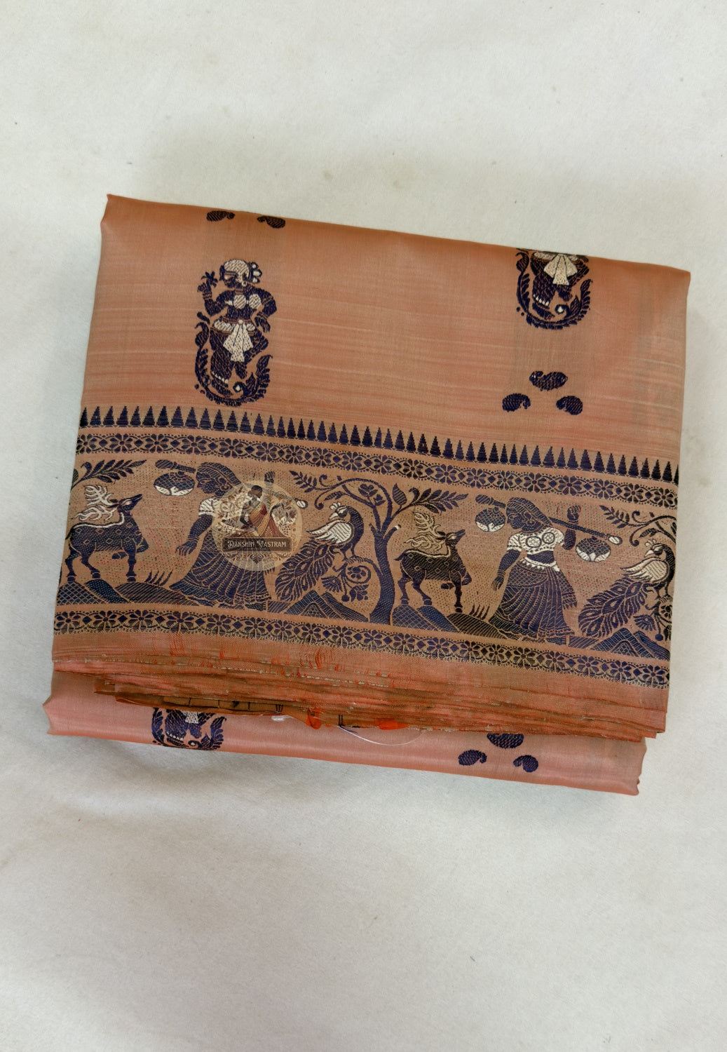 Full view of Copper Peach Baluchari Silk Saree by Dakshin Vastram, handwoven in Bengal for weddings, Diwali and cultural celebrations in UK, USA, EU and India
