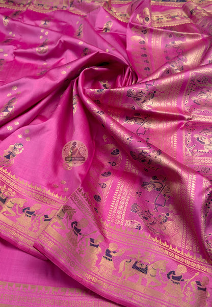 Close-up of Swarnachari silk saree pallu showing hand-woven golden zari weave with shifting light and Bengal temple-art motif detail, pit-loom West Bengal