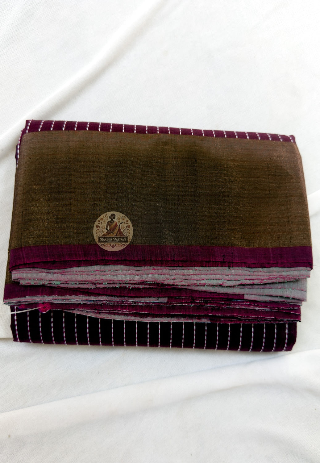 Macro close-up of individual hand-woven heritage motif on Bishnupur Katan Silk Saree by Dakshin Vastram, each pattern woven slowly and precisely at the handloom in Bishnupur Bengal — some things are worth taking time over