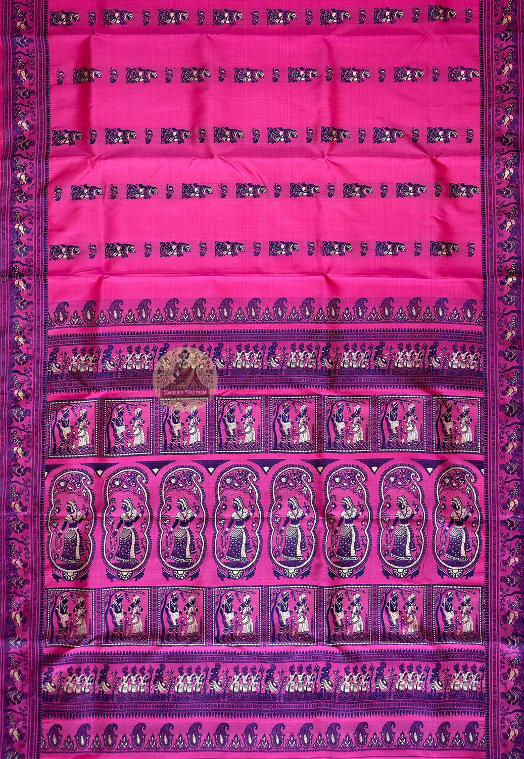Close-up of running blouse fabric from Rani Pink Baluchari Silk Saree set, featuring coordinating handwoven rani pink pure silk with complementary navy Baluchari motif border detail