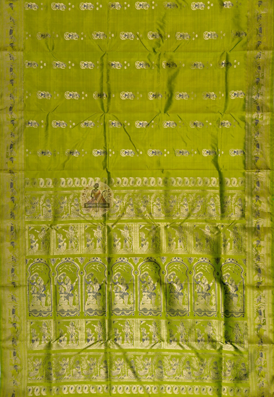 Close-up of golden zari lotus medallion border detail on Swarnachari Silk Saree Durga Puja Saptami 2026 Bengal