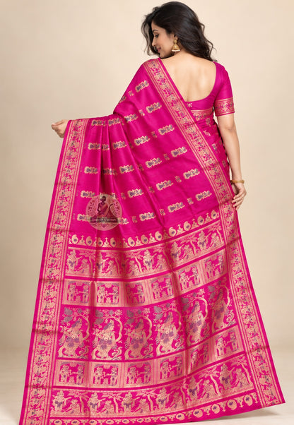 Rear view of rani pink Swarnachari silk saree with the figurative pallu draped over the shoulder