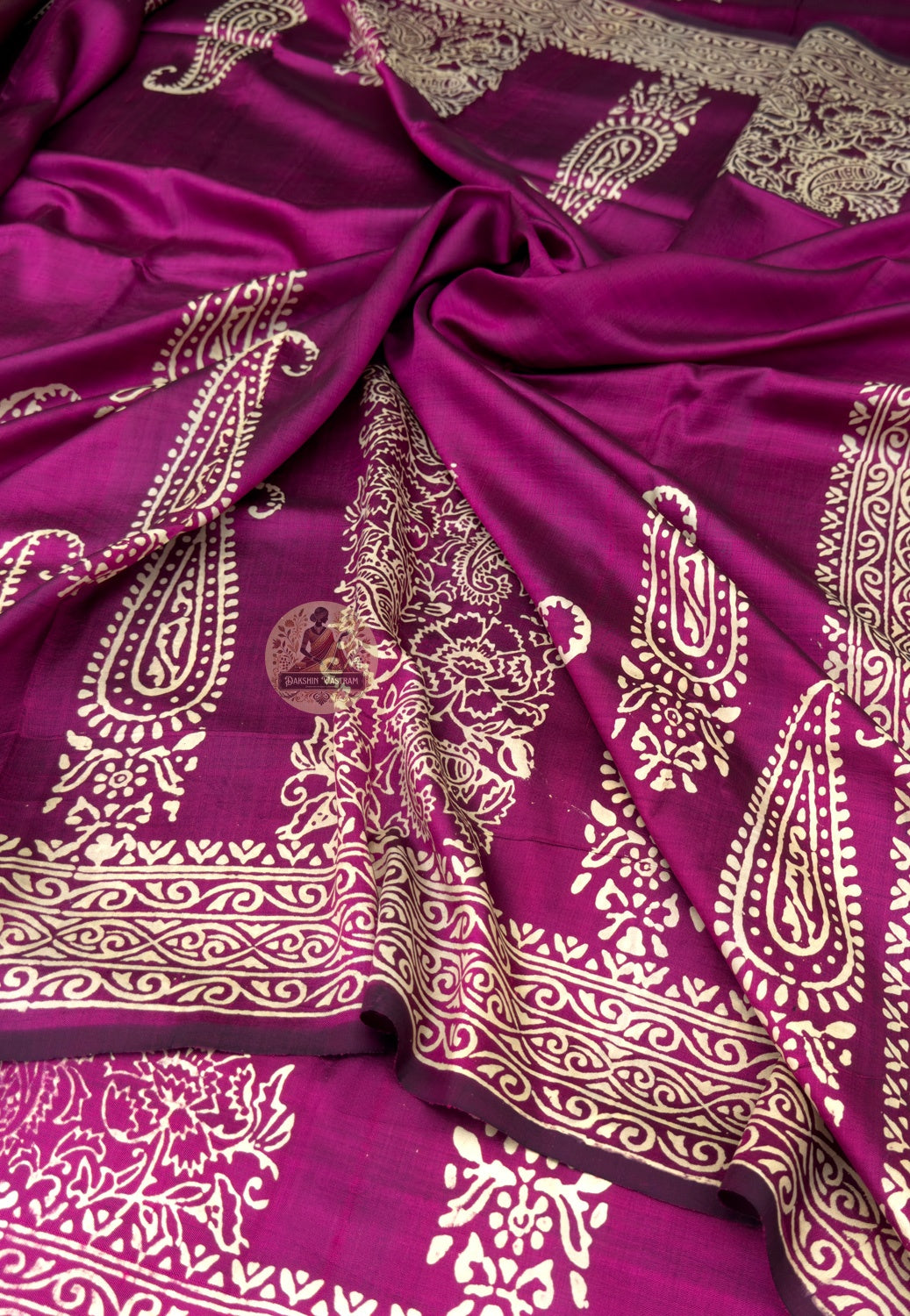Close-up of hand-woven terracotta temple and Bengal folk motifs on the pallu of a Bishnupur Katan Silk Saree, crafted by master weavers using centuries-old techniques