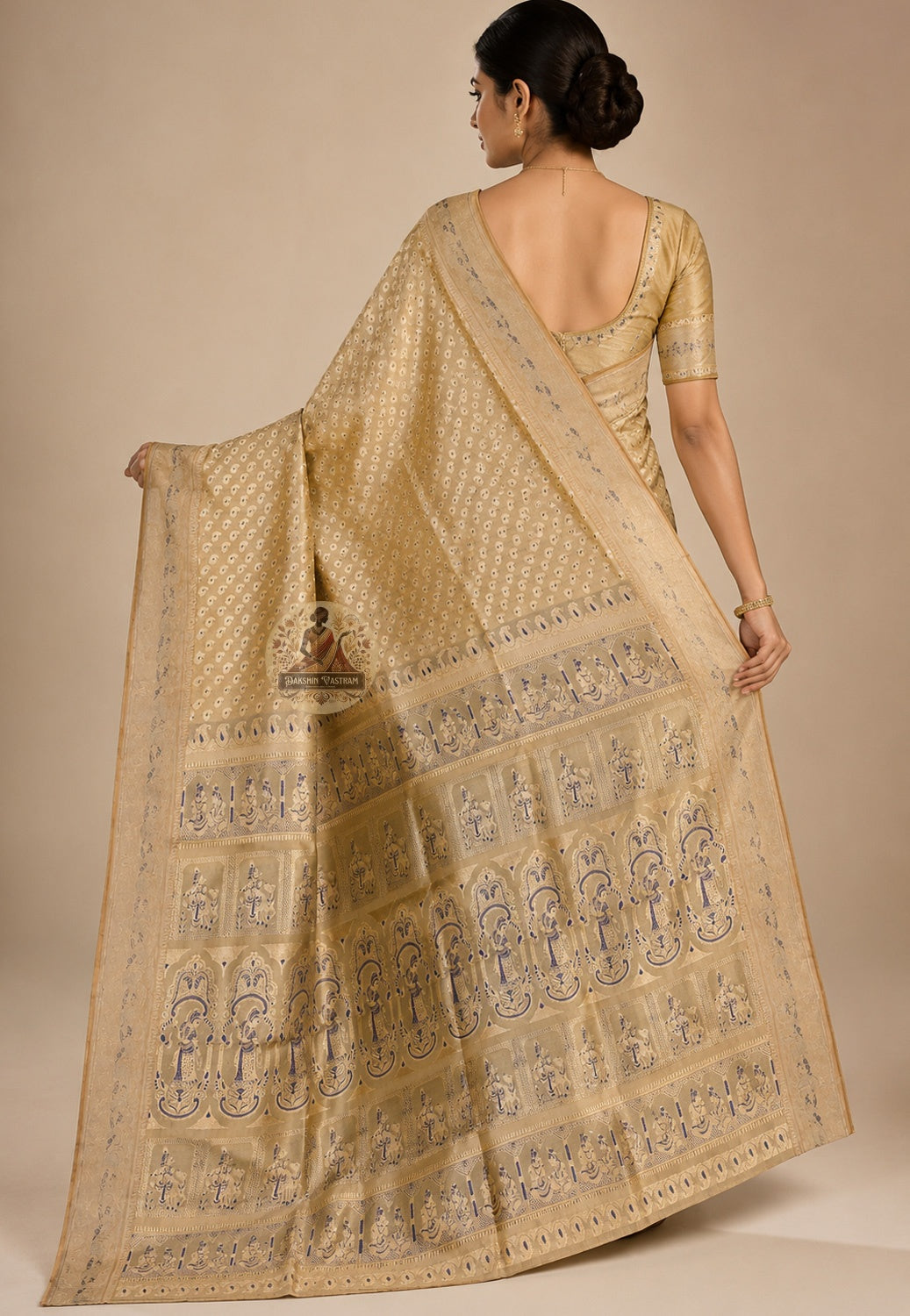 Front view of woman in premium Swarnachari pure silk saree, traditional Bengali drape with densely woven golden zari pallu cascading over shoulder