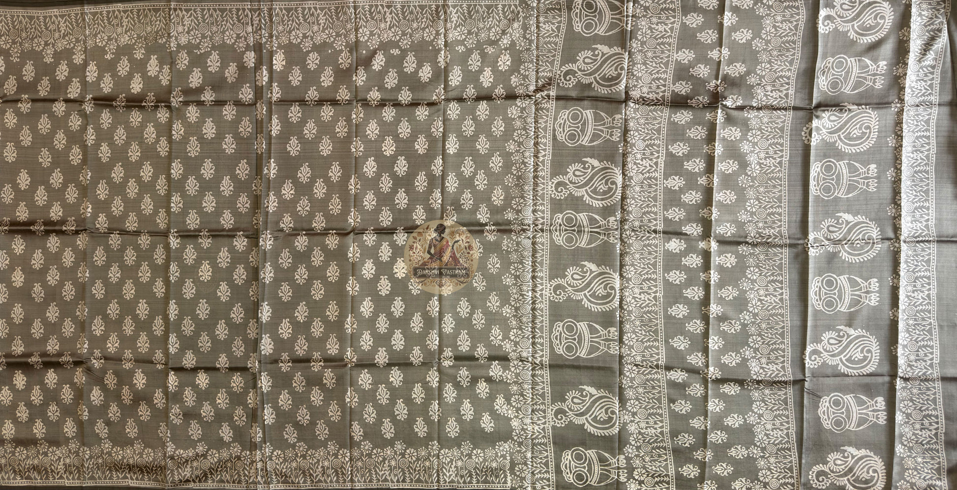 Rear view of Bishnupur Katan silk saree displaying hand block print pallu with floral and figurative compositions drawn from Bishnupur's Rasmancha and Shyamrai temple visual heritage