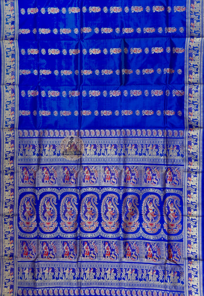 Full saree view of royal blue Baluchari silk saree with repeating motifs and an elaborate pallu