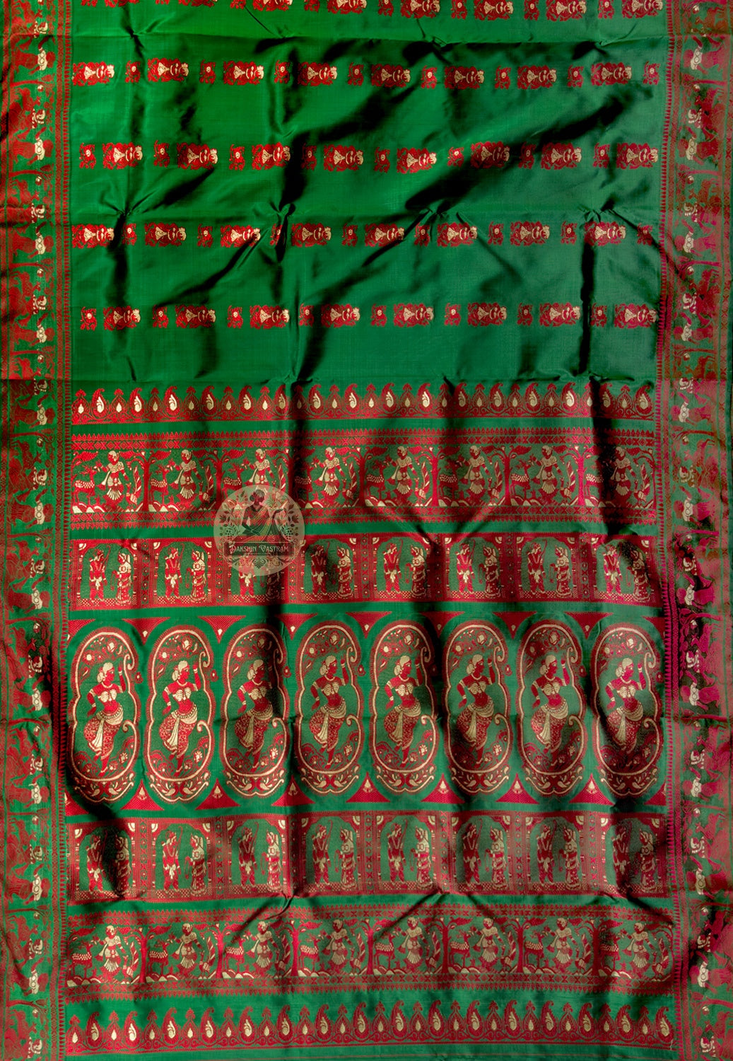 Close-up of Bishnupur Baluchari silk saree weave showing Ramayana narrative figures and Mahabharata episode scenes woven thread by thread in pure silk on traditional handloom