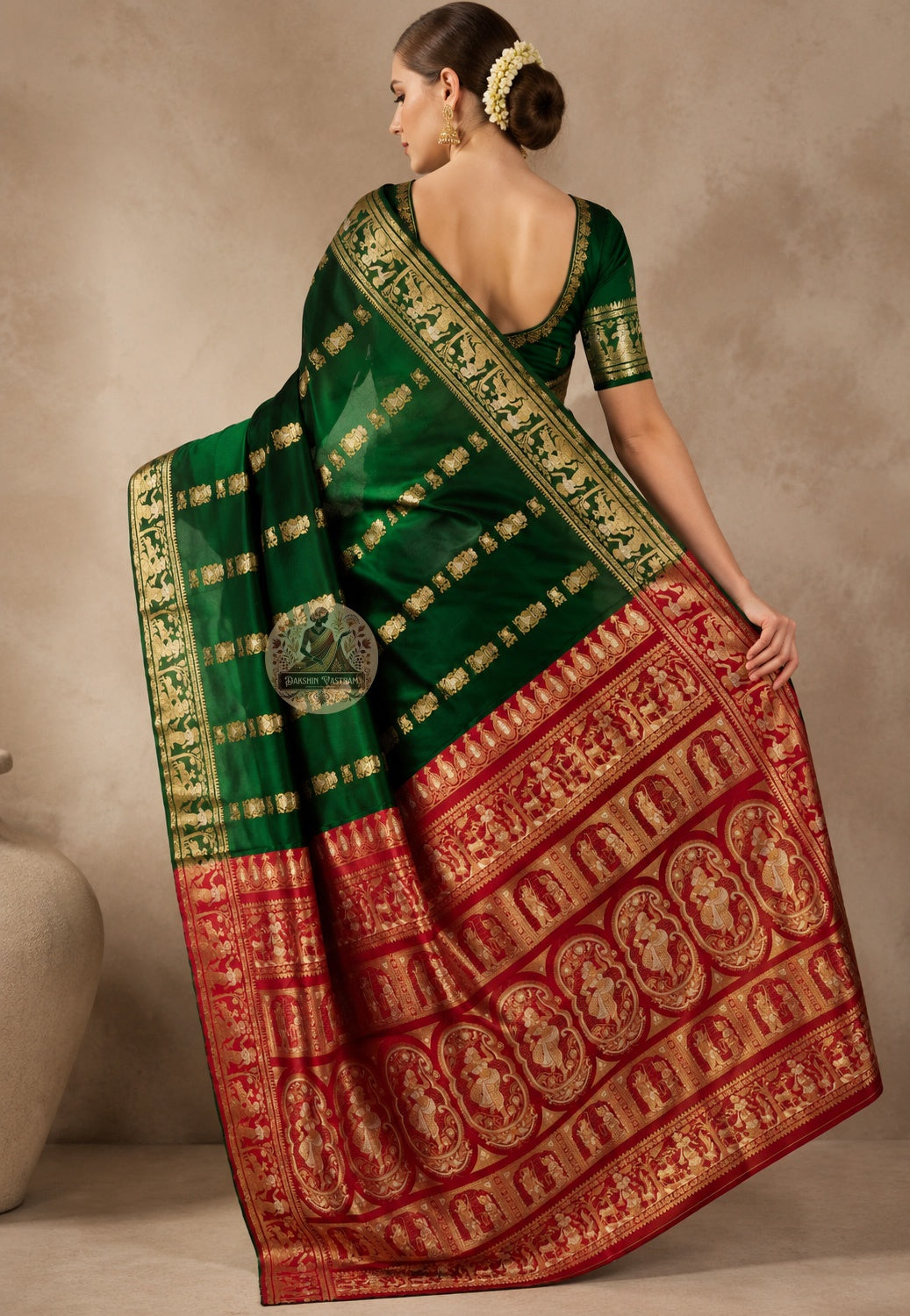 Front view of woman in Swarnachari pure silk saree, traditional Bengali drape with golden zari craft pallu carrying Bengal's weaving identity over left shoulder