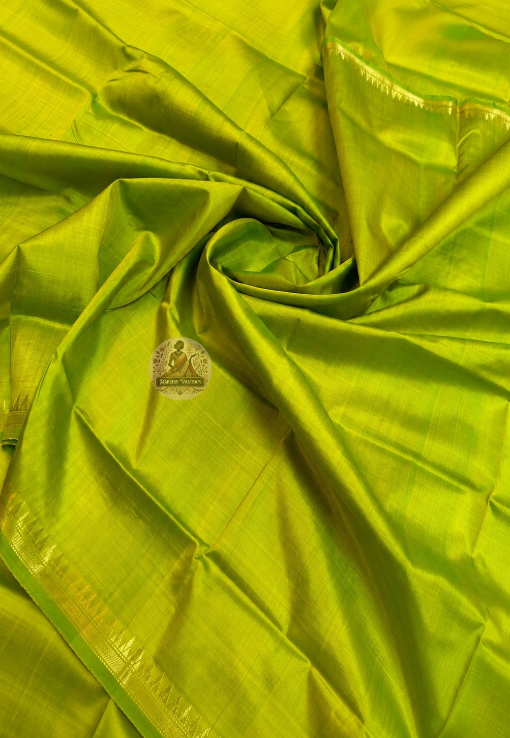 Bishnupur silk saree flat lay showing complete length with decorative border, blouse piece, and fall-pico finished edges