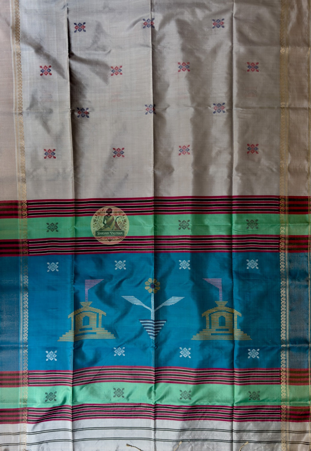 Close-up of handwoven kantha square grid with zari foliage buti detail on Bishnupur Katan Silk Saree border