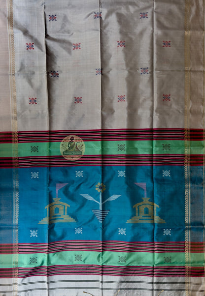Close-up of handwoven kantha square grid with zari foliage buti detail on Bishnupur Katan Silk Saree border