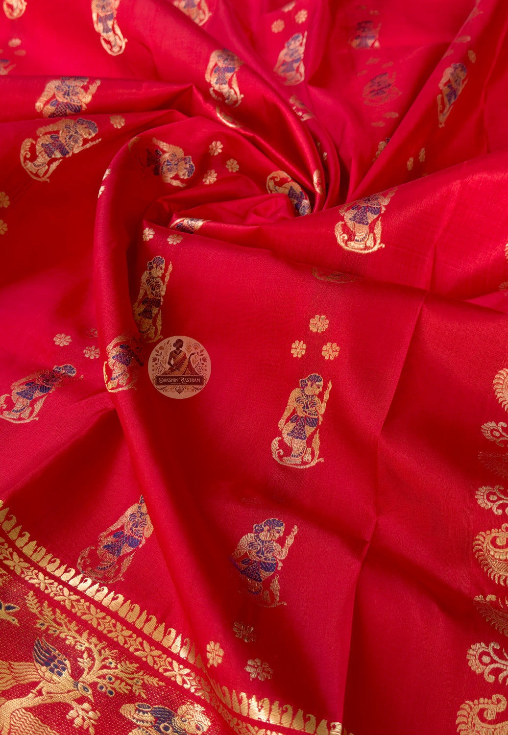 Side view of Swarnachari pure silk identity saree displaying natural fluid drape and golden zari luminescence for Indian weddings Durga Puja Diwali and classical cultural performances