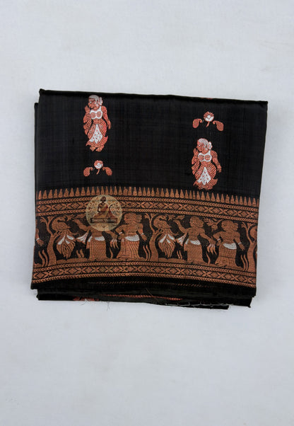 Close-up of Swarnachari silk saree pallu showing hand-woven golden zari panels with Ramayana-inspired mythological motifs