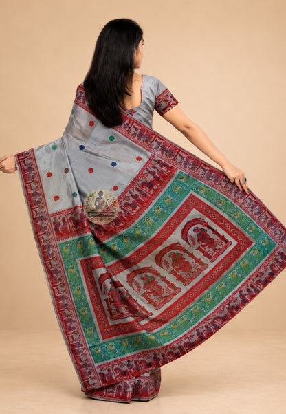 Rear view of premium Baluchari Silk Saree revealing the full pallu with hand-woven Mahabharata and Ramayana figures — royal processions, celestial dancers and sages — in pure Bengal silk