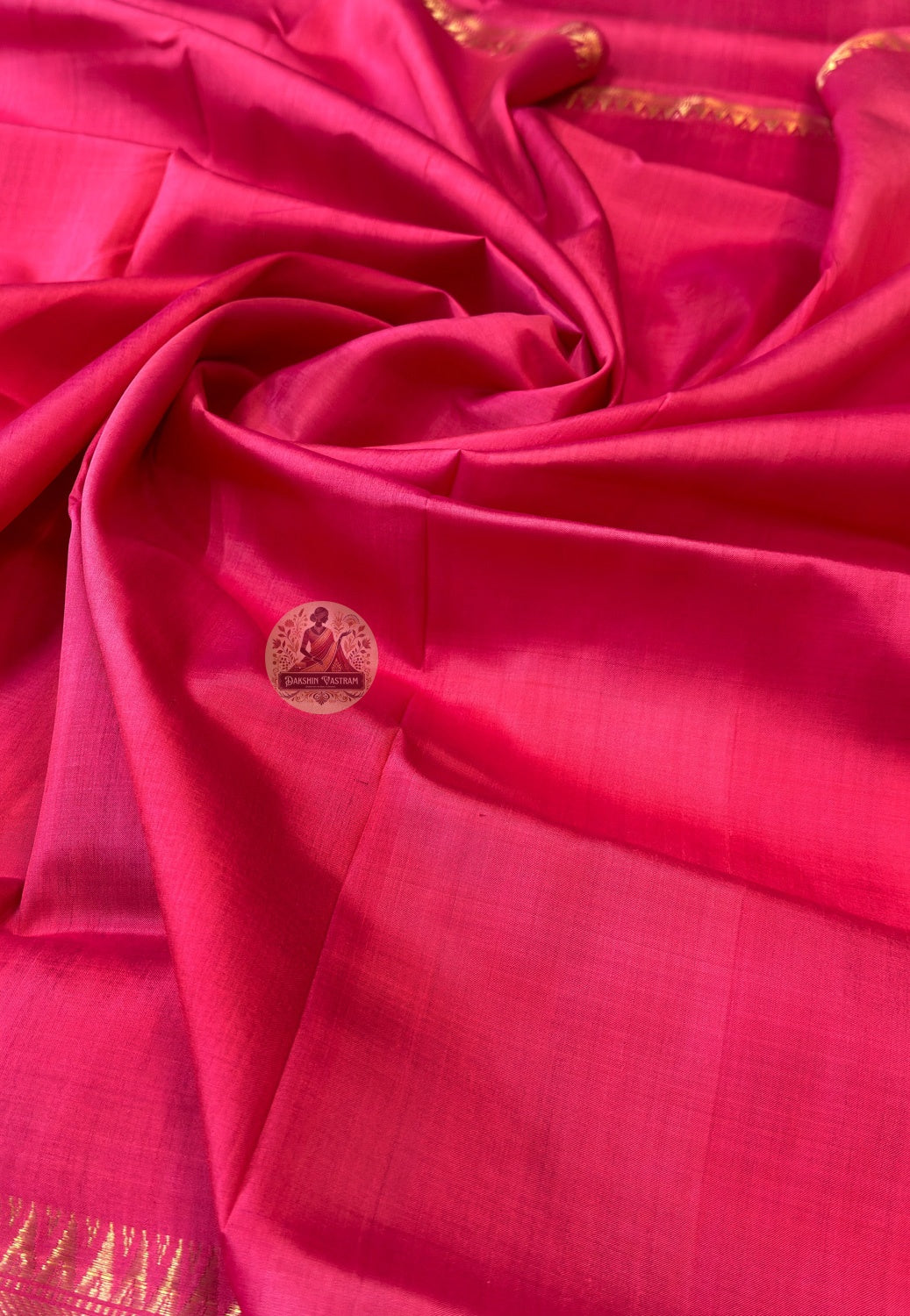 Detailed close-up of hand-woven border on Bishnupur Pure Katan Silk Saree showing the warmth and depth of pure handloom Katan silk crafted entirely by human hands in the heritage town of Bishnupur Bengal