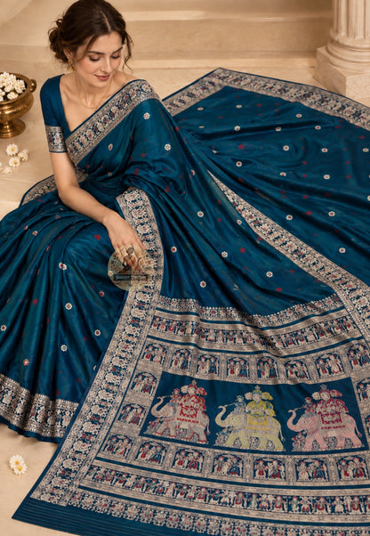Side view of Baluchari pure silk saree displaying natural fluid drape and coloured silk narrative motifs for Durga Puja Ashtami Indian weddings classical performances and cultural galas