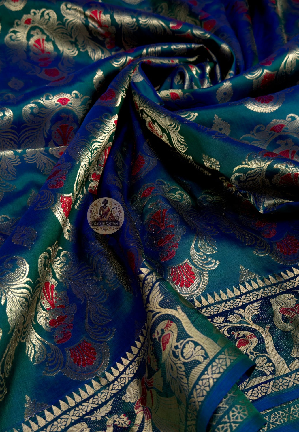 Close-up of pure golden zari mythology motifs handwoven into Swarnachari silk saree pallu