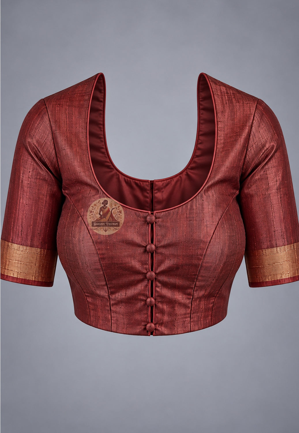Blouse paired with deep red Ghicha Tussar silk saree in a coordinating dark red shade
