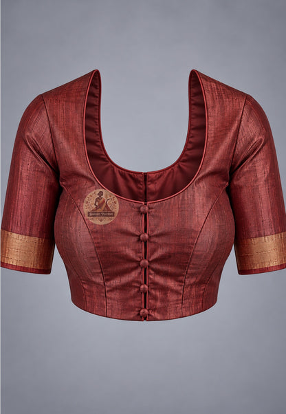 Blouse paired with deep red Ghicha Tussar silk saree in a coordinating dark red shade