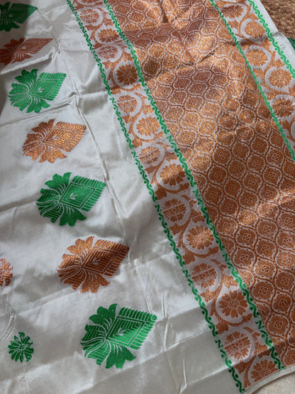 Side view of Paat Mekhela Chador showing Bihu gala drape and elephant procession handloom border authentic Sualkuchi Assam mulberry silk