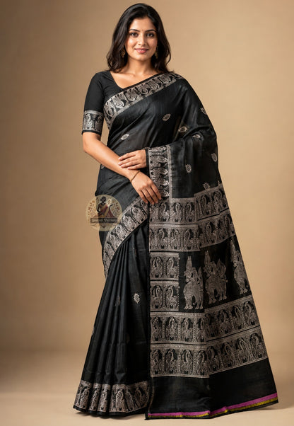 Front view of woman wearing Bishnupur Katan Silk Saree with cotton blouse Navratri Onam daytime occasion