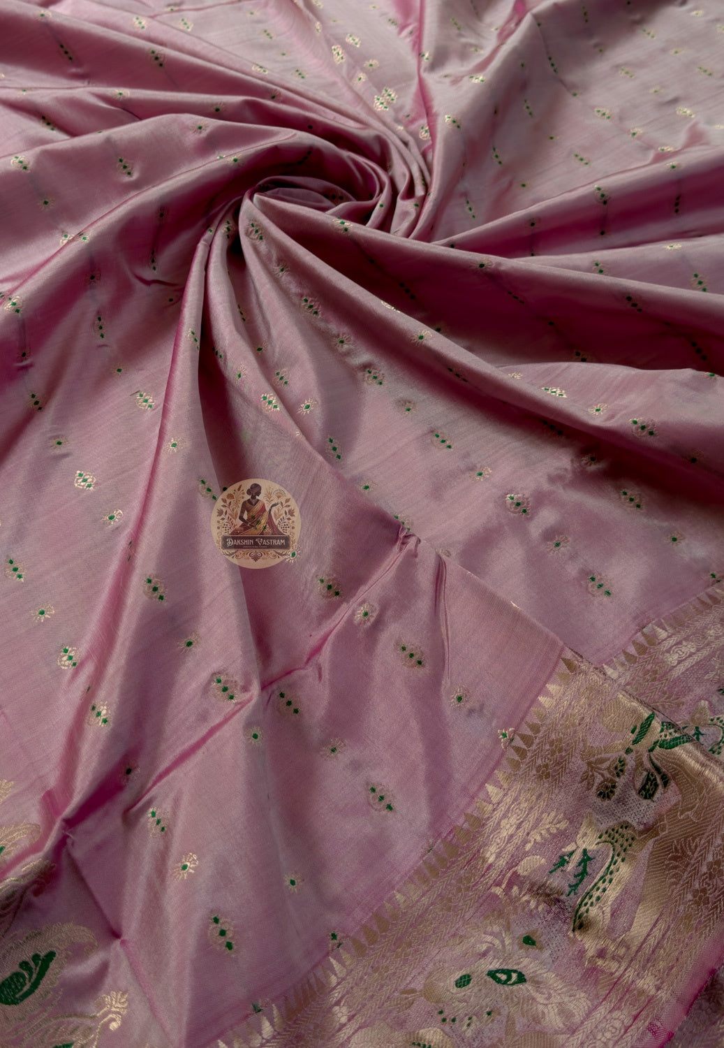 Side view of Swarnachari pure silk heritage saree displaying natural fluid drape and golden zari luminescence for Indian weddings Durga Puja Diwali and classical performances